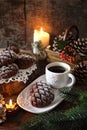 Christmas chocolate pine cone shortbread cookie and cup of coffee, New Year`s decoration