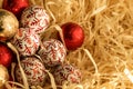 Christmas chocolate sweets: gold, red, white. Holiday gift.