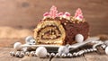 Christmas chocolate swiss roll and decoration Royalty Free Stock Photo