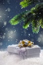 Christmas. Christmas gift box in abstract snowy scene. Christmas time Royalty Free Stock Photo