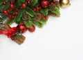 Christmas cinammon and decorations on white Royalty Free Stock Photo