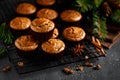 Christmas cinnamon muffins on black background Royalty Free Stock Photo