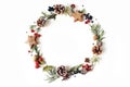 Christmas circle floral composition. Wreath of cypress, eucalyptus branches, pine cones, rowan berries, anise, confetti Royalty Free Stock Photo