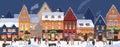 Christmas city panorama with happy people walking on street in snow on winter holidays. European Old town at Xmas eve