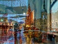 Christmas city Reflection in windows Street cafe evening  light  blur ,people walking on street , Christmas tree illumination refl Royalty Free Stock Photo