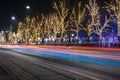 Christmas city street transport motion colorful illumination lighting from car headlights and trees garland illumination winter Royalty Free Stock Photo