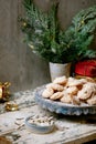 Christmas coconut gluten free cookies with coconut flakes on Christmas table.