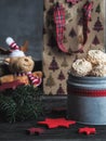 Christmas coconut meringue cookies in metal box and christmas presents.