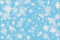 Christmas cold blue background with snow flakes and stars with b