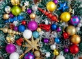 Christmas collection of New Year decorations. a big pile of christmas toys and tinsel while happy anticipation of new year Royalty Free Stock Photo