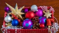 Christmas collection of New Year decorations. a big pile of christmas toys and tinsel while happy anticipation of new Royalty Free Stock Photo