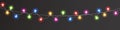 Christmas color lights on long background. Garland lights decoration. Led neon lamp. Glow colored bulb. Bright Royalty Free Stock Photo