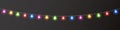 Christmas color lights on long banner. New Year garland lights decoration. Led neon lamp. Glow colored bulb. Bright Royalty Free Stock Photo