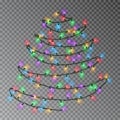 Christmas color tree of lights string hanging on wall. Transparent effect decoration isolated on dar