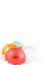 Christmas colored balls in white clouds Royalty Free Stock Photo