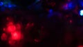 Christmas colorful New Year`s Bokeh neon lights. Abstract Blurred photo background with blinking lights from tangled garlands. Dec Royalty Free Stock Photo