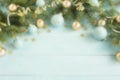 Christmas composition background from Christmas tree branches and gold blue decorations Royalty Free Stock Photo