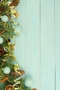 Christmas composition background from Christmas tree branches and gold blue decorations Royalty Free Stock Photo
