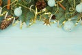 Christmas composition background from Christmas tree branches and gold blue decorations Royalty Free Stock Photo