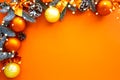 Christmas composition. Background orange colors with decorations.