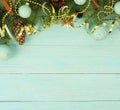 Christmas composition background from Christmas tree branches and gold blue decorations Royalty Free Stock Photo