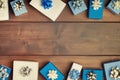 Christmas composition, beautiful frame. Small blue and white gift boxes, with beautiful silver bows. Copy space. Holiday Royalty Free Stock Photo