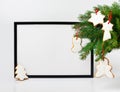 Christmas composition. Black frame and branches christmas tree