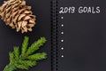 Christmas composition. Black open notepad. 2019 goals Royalty Free Stock Photo