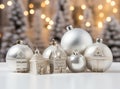 Christmas composition. Christmas balls white and silver, decorative house, christmas tree on white background