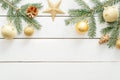 Christmas composition. Christmas decorations, fir tree branches, golden ornaments on wooden white rustic background. Flat lay, top Royalty Free Stock Photo