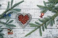 Christmas composition Christmas tree branches, Christmas decorations, red gift boxes in a wicker basket in the shape of a heart Royalty Free Stock Photo