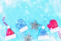 Christmas composition from Christmas tree toys. White decor on a blue background. Copy space, flat lay, top view. Royalty Free Stock Photo