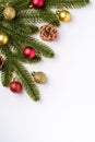 Christmas composition with copy space. Colorful ornament, baubles and fir needles decorations Royalty Free Stock Photo