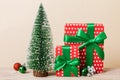 Christmas composition. craft Gift box, small tree, branches and craft DIY decorations on white background. New year Royalty Free Stock Photo