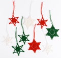 Christmas composition of crocheted white snowflakes and stars on white background. Top view, flat lay, copy space. Royalty Free Stock Photo