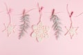 Christmas composition of crocheted white snowflakes and stars on pink background. Top view, flat lay, copy space. Royalty Free Stock Photo