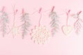 Christmas composition of crocheted white snowflakes and stars on pink background. Top view, flat lay, copy space. Royalty Free Stock Photo