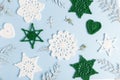 Christmas composition of crocheted white snowflakes and stars on white background. Top view, flat lay, copy space. Royalty Free Stock Photo