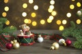 Christmas composition with cute teddy bear, glass balls and fir