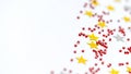 Christmas composition decoration. Pattern made of silver and gold star, golden decorations and red berries Royalty Free Stock Photo