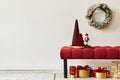 Christmas composition with decoration, christmas tree, gifts, snow and accessories in cozy home decor. Copy space.