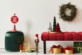 Christmas composition with decoration, christmas tree, gifts, snow and accessories in cozy home decor. Copy space.