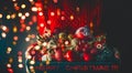 Christmas composition, Christmas decorations in the hands of a girl on the background of garlands, bokeh Royalty Free Stock Photo