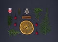 Christmas composition, Christmas decorations, pine branches and cones on a black background, top view Royalty Free Stock Photo