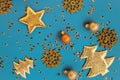 Christmas composition with decorative golden star, fir tree, balls and  snowflakes on blue background with sequins Royalty Free Stock Photo