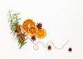 Christmas composition with dried oranges and spices on white background. Natural food ingredient for cooking or Christmas decor