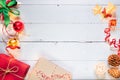 Christmas composition festive. Christmas decorations and xmas gift boxes on wooden white table background. Celebration for holiday Royalty Free Stock Photo