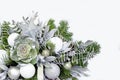 Christmas composition of fir branches, balls of silver laurel leaves. Happy New Year greeting card background. Holiday home Royalty Free Stock Photo