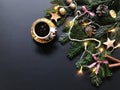 Christmas composition with fir tree branches and Christmas decorations, a cup of coffee with cinnamon cookies.