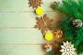 Christmas composition - flat lay photo with christmas tree branches and candles on wooden background. Royalty Free Stock Photo